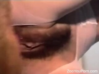 Aroused furry dog is fucking passionately the hairy pussy